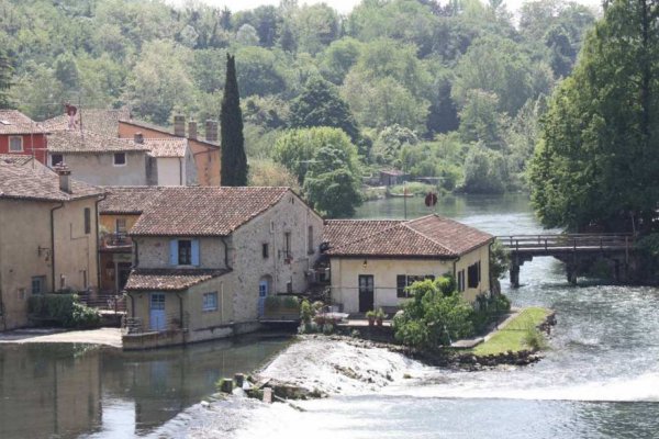 Borough near river peschera mantova path